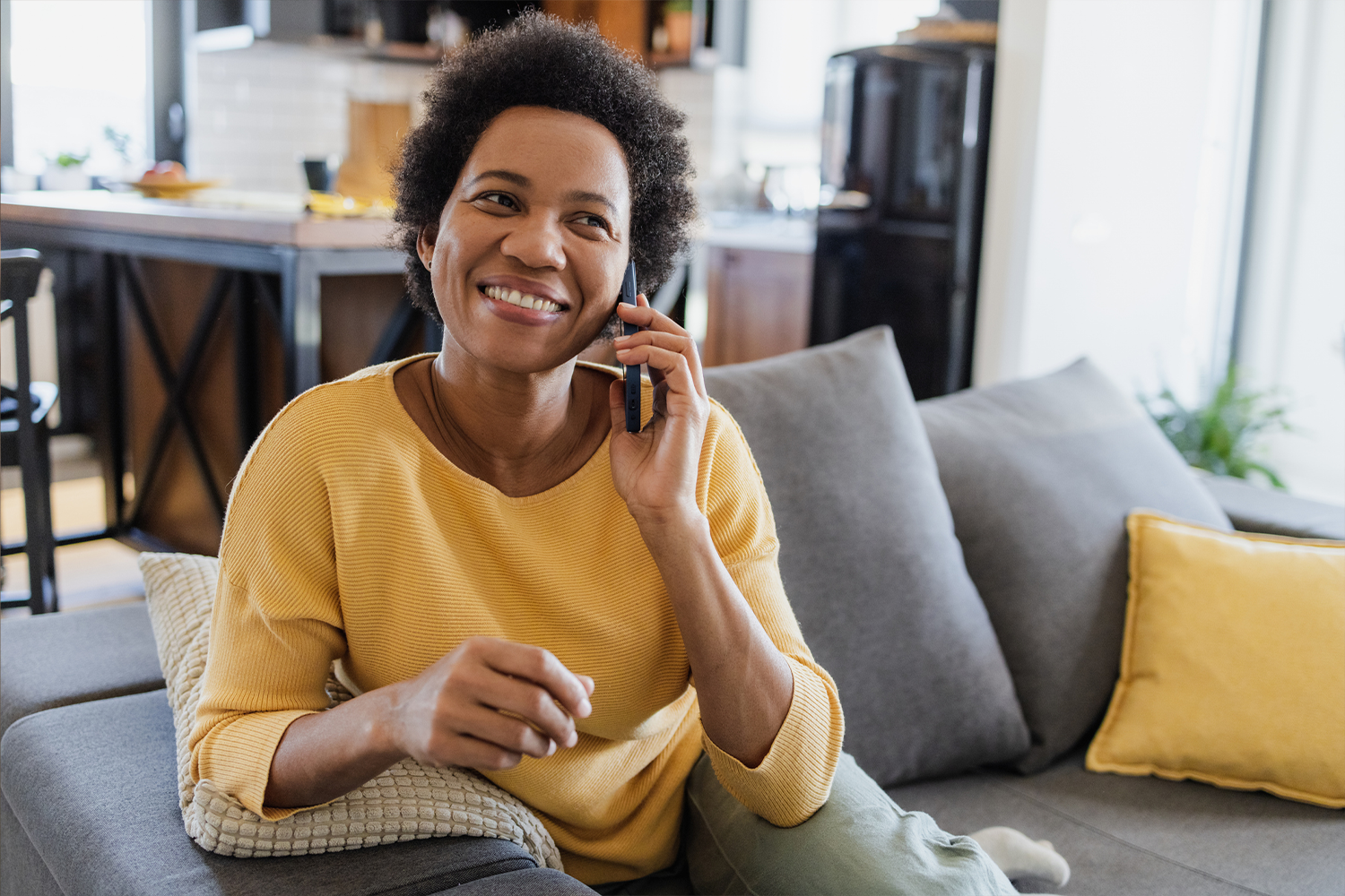 Woman on phone working with disability representative.